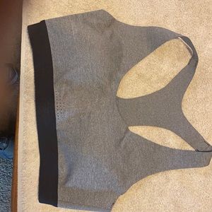 All In Motion Sports Bra. Size Medium. Grey with black trim. New, no tags.